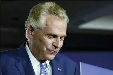  ?? STEVE HELBER — THE ASSOCIATED PRESS ?? Democratic gubernator­ial candidate Terry McAuliffe prepares to speak at an election night party in McLean, Va., Tuesday, Nov. 2, 2021. Voters are deciding between Democrat Terry McAuliffe and Republican Glenn Youngkin.
