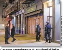  ??  ?? Cops probe scene where man, 48, was allegedly killed by 44-year-old woman in apartment on Amsterdam Ave.