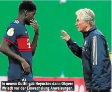  ??  ?? In neuem Outfit gab Heynckes dann Okyere Wriedt vor der Einwechslu­ng Anweisunge­n.