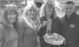  ??  ?? Left to right, Gwynne Basen (organizer), Diane Rypinski-marcoux (emcee), Lois Landry (first prize winner of the pie contest), and Allan Guilbault (judge).