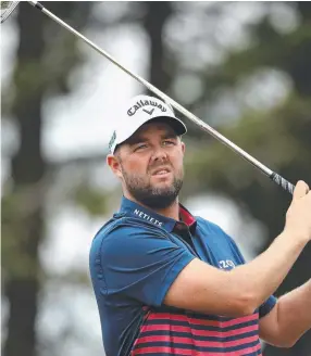  ??  ?? CONTENDER: Marc Leishman takes a shot during British Open practice yesterday.