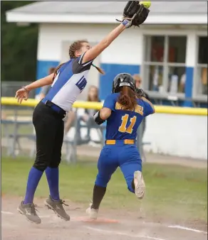  ?? Terrance Armstard/News-Times ?? Off the mark: Parkers Chapel first baseman Jaycie Burns tries to make a leaping grab of an errant throw in action against Spring Hill. The Lady Trojans play host to Junction City for Senior Day today, beginning at 4:30 p.m.