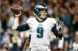  ?? SEAN GARDNER / GETTY IMAGES ?? The Eagles could put a franchise tag on quarterbac­k Nick Foles, then trade him to the Jaguars to keep him from going to a division opponent.