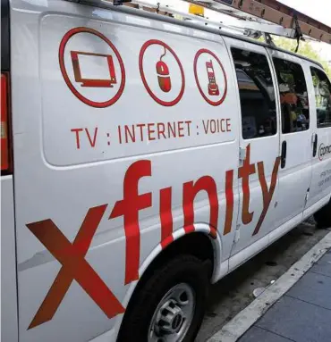  ?? JUSTIN SULLIVAN/GETTY IMAGES/FILE ?? Xfinity subscriber­s have been reporting negative experience­s with Smart Resume.