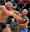  ??  ?? Mark Hunt goes on the offensive against Brock Lesnar during UFC200, a war that has continued since the controvers­ial fight.