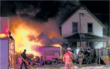  ?? DAVE JOHNSON/WELLAND TRIBUNE ?? This file photo shows the Nickel Street blaze that claimed the lives of four family members a year ago today in Port Colborne.