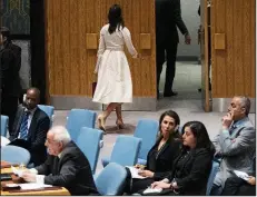  ?? AP/MARY ALTAFFER ?? Nikki Haley, the U.S. ambassador to the United Nations, listens Tuesday at a U.N. Security Council meeting as Bolivian Ambassador Sacha Llorenti criticizes the U.S. decision to move its embassy in Israel to Jerusalem. At right, Haley walks out of the meeting as Palestinia­n U.N. Ambassador Riyad Mansour (bottom left) prepares to address the Security Council.