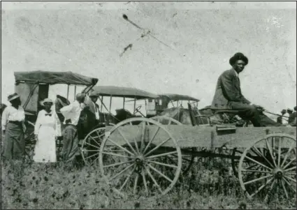  ?? PROVIDED BY THE CITY OF GREELEY MUSEUMS, PERMANENT COLLECTION ?? Workers in the town of Dearfield, which was founded east of Greeley around 1910. The National Park Service says it was “the largest Black homesteadi­ng settlement in Colorado.”