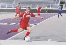  ?? Graham Thomas/Siloam Sunday ?? Jack Bos takes a kick during the Arkansas High School Coaches Associatio­n All-Star Boys Soccer Game at Estes Stadium on the campus of the University of Central Arkansas in Conway. Bos was named the game’s Most Valuable Player after leading the West to...