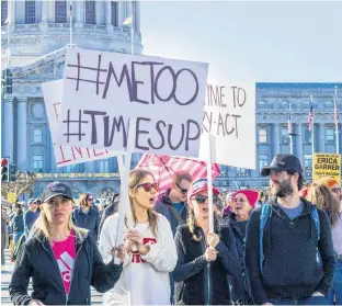  ?? 123RF STOCK PHOTO ?? Women’s March protesters hold signs with “Me too” and “Time’s Up” slogans written on them during a rally in San Francisco, Calif. on Jan. 20, 2018.