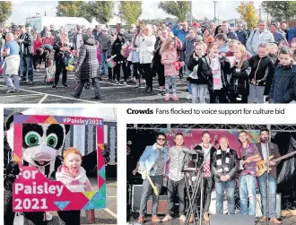  ??  ?? Smiles Paisley Panda with a pal Crowds Fans flocked to voice support for culture bid