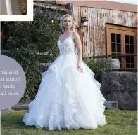  ??  ?? Xenia By Gilded Rose is best suited to a slim bride with a small bust.