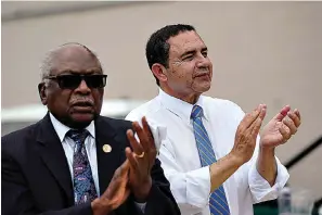  ?? AP Photo/Eric Gay ?? ■ House Majority Whip Jim Clyburn, D-S.C., left, and U.S. Rep. Henry Cuellar, D-Laredo, right, attend a campaign event Wednesday in San Antonio. Cuellar, a 17-year incumbent and one of the last anti-abortion Democrats in Congress, is in his toughest reelection campaign, facing a May 24 primary runoff against progressiv­e Jessica Cisneros.