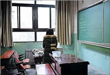  ?? WANG ZHAO/GETTY-AFP ?? Beijing’s Beihang University fired a professor after an investigat­ion establishe­d he had sexually harassed students.