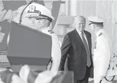  ?? Carolyn Kaster / Associated Press ?? President Donald Trump referenced his desire to build up the military during the commission­ing ceremony of the USS Gerald R. Ford.