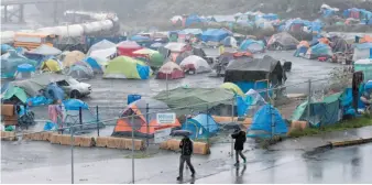  ?? CP PHOTO ?? A homeless camp in downtown Nanaimo is seen on Sept. 22. An open letter is calling on the City of Nanaimo to delay closing the camp.