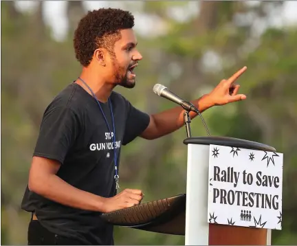  ?? STEPHEN M. DOWELL/ORLANDO SENTINEL/ TNS ?? Maxwell Frost, National Organizing Director for March For Our Lives, speaks during last year’s March For Our Lives Florida drive-in rally and aid event at Tinker Field in Orlando. The event was held to speak out against Governor Ron Desantis’ protest bill, HB 1.