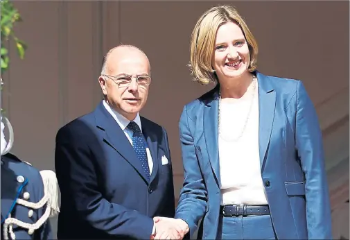  ??  ?? WELCOME: French Interior Minister Bernard Cazeneuve and Home Secretary Amber Rudd meet in Paris to discuss the future of border controls. Picture: Francois Mori