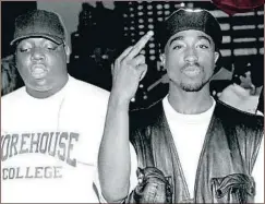  ?? AL PEREIRA / GETTY ?? Los raperos The Notorious B.I.G y Tupac Shakur, en 1993