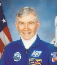  ?? NASA ?? John Young salutes the U.S. flag on the moon during the Apollo 16 mission in April 1972. The astronaut also commanded the first space shuttle flight. Young was the longest-serving astronaut, working with NASA into his 70s and stressing crew safety.