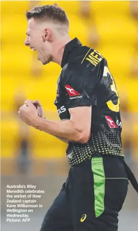  ??  ?? Australia’s Riley Meredith celebrates the wicket of New Zealand captain Kane Williamson in Wellington on Wednesday.
Picture: AFP