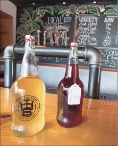  ?? Justin Weekes / New England Cider Company photo ?? Bottles of cider on display at New England Cider Co., which is based in Wallingfor­d.