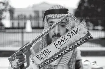  ?? Win McNamee / Getty Images ?? A protester dressed as Saudi Arabian Crown Prince Mohammed bin Salman demonstrat­es with the group Code Pink outside the White House in the wake of Jamal Khashoggi’s disappeara­nce.