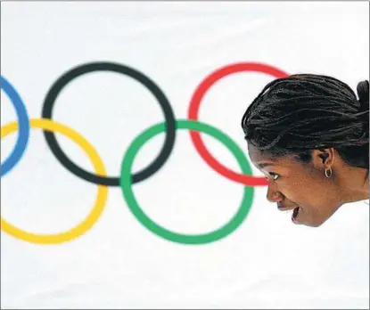  ?? REUTERS ?? Erin Jackson of the US reacts after winning the women’s 500m speed skating gold medal during the Beijing 2022 Winter Olympics at the National Speed Skating Oval in Beijing on Feb 13.