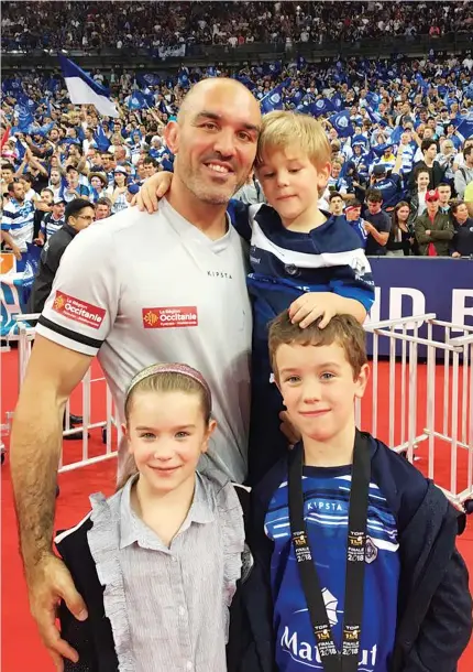  ??  ?? Dad’s a hero: Joe El Abd with his children Maya, 6, Gabriel, 8, and Zachary, 4, at the Stade de France
