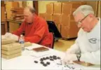  ?? SUBMITTED PHOTO — ST. MARK’S CHURCH ?? Volunteers at St. Mark’s Church in Conshohock­en create the church’s signature Easter egg candies. The church has been making the holiday treats for 100 years.