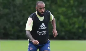  ??  ?? Arsenal’s Alexandre Lacazette, pictured training this week, says victory over Chelsea in the FA Cup final would ‘save our season’. Photograph: Stuart MacFarlane/Arsenal FC/Getty Images