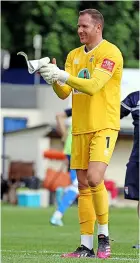  ??  ?? Ryan Clarke applauds the travelling fans