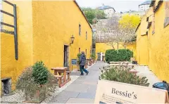  ?? ?? The vivid yellow outside seating area at Bessie’s