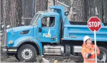  ?? JOSH EDELSON AFP/GETTY IMAGES ?? PG&amp;E’s stock lost nearly 70 per cent of market value since early November as investors worried about potential liabilitie­s for the role the firm’s equipment may have played in multiple wildfires.