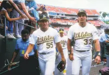  ?? Otto Greule Jr / Allsport 1990 ?? A’s outfielder Jose Canseco (33) with his brother Ozzie. When Jose Canseco broke his hamate it was an unknown injury.