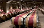  ?? LIA ZHU / CHINA DAILY ?? The cellar of the Robert Mondavi Winery is a highlight of visitors’ tour.