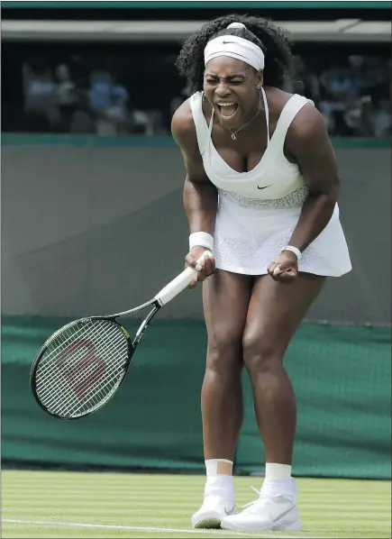  ?? — THE ASSOCIATED PRESS ?? Serena Williams shouts out during her first-round match against Margarita Gasparyan at Wimbledon in London on Monday. Williams won 6-4, 6-1.