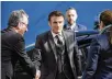  ?? JOHN THYS, POOL PHOTO VIA AP ?? France’s President Emmanuel Macron, center, arrives for an EU summit in Brussels, on Thursday.