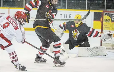  ?? BOB TYMCZYSZYN TORSTAR ?? St. Catharines’ Nicholas Rubino scores on Hamilton’s Braedyn McIntosh in the Falcons’ 1-0 win Friday night.