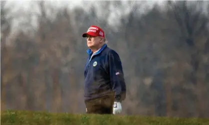  ?? Photograph: Al Drago/Getty Images ?? Donald Trump playing golf on Sunday at Trump National Golf Club in Sterling, Virginia.