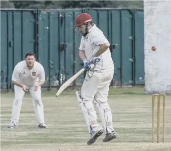  ??  ?? Murton opener Gavin Milne turns the ball to leg as a Ryhope’s short leg hopes for a catch.