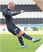  ??  ?? ■ Falkirk’s Craig Sibbald scores.