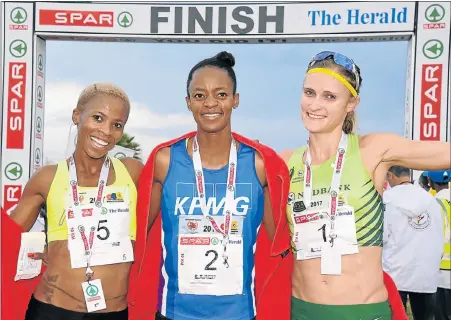  ?? Picture: EUGENE COETZEE ?? TOP THREE: SPAR 10km Women’s Challenge winner Kesa Molotsane, centre, is flanked by Mapaseka Makhanya (third), left, and Irvette van Zyl (second)