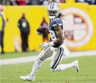  ?? ?? Dallas Cowboys wide receiver CeeDee Lamb runs against the Washington Commanders last Sunday in Landover, Md.