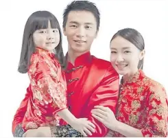  ?? Picture: CHINESENEW­YEAR.NET ?? A red Tang suit is a great choice for the Spring Festival.