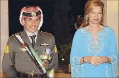  ?? Hussein Malla / Associated Press ?? Jordan’s Prince Hamza, seen with his mother Queen Noor, right, said he has been placed under house arrest. He is the half-brother of Jordan’s King Abdullah II.