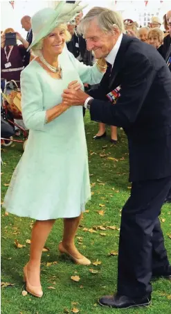  ??  ?? Veteran’s dance: Jim Booth with Duchess of Cornwall in 2015