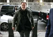  ?? AL DRAGO, FILE - THE ASSOCIATED PRESS ?? In this Nov. 8, 2019 file photo, former White House strategist Steve Bannon arrives to testify at the trial of Roger Stone, at federal court in Washington. Bannon was arrested Thursday, Aug. 20, on charges that he and three others ripped off donors to an online fundraisin­g scheme “We Build The Wall.” The charges were contained in an indictment unsealed in Manhattan federal court.