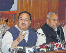  ?? DEEPAK SANSTA/HT ?? BJP national president JP Nadda (left) addresses a press conference in Shimla on Sunday.