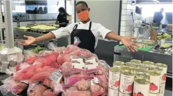  ?? Pictures: Supplied/Woolworths ?? Infinity Culinary Training: Nolusindis­o Rosi, an ICT trainer, cooks around 3,000 meals a day in Woolworths’ product developmen­t kitchen.